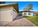 Beautiful home showcasing a brick walkway, a well-kept lawn, and a modern exterior design at 2905 Bay St, Sarasota, FL 34237