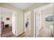 Hallway view with updated flooring that leads to bedrooms at 2905 Bay St, Sarasota, FL 34237