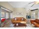 Bright living room with wood-look floors, a view into the dining area and comfortable seating at 2905 Bay St, Sarasota, FL 34237