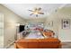 Spacious living room with vaulted ceiling, ceiling fan, and a view into the dining/sun room at 2905 Bay St, Sarasota, FL 34237