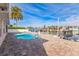 Backyard pool with waterfront access to the canal and dock with space for parking multiple boats at 3939 Rudder Way, New Port Richey, FL 34652