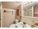 Vintage bathroom featuring patterned wallpaper, a vanity, and a shower with glass doors at 4307 Woodmans Chart # 132, Sarasota, FL 34235