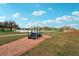 Scenic park view featuring exercise steps overlooking a lake, offering a serene outdoor experience at 4307 Woodmans Chart # 132, Sarasota, FL 34235