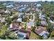 Beautiful aerial view of community featuring many homes, lush landscaping, and easy water access at 4309 Deepwater Ln, Tampa, FL 33615