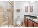 Bright bathroom showcasing a glass-enclosed shower and a modern vanity at 5147 Elwood Rd, Spring Hill, FL 34608