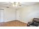 Living room showing white interior door and closet, and tile floor at 5202 Cumberland Dr, Tampa, FL 33617