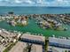 Aerial view of canal-front homes and condo complexes at 521 Pinellas Bayway S # 104, St Petersburg, FL 33715