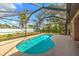 Beautiful screened-in pool with clear blue water, perfect for relaxation at 5327 N Cranberry Blvd, North Port, FL 34286