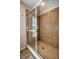 Shower features a glass door and tiled walls at 5327 N Cranberry Blvd, North Port, FL 34286