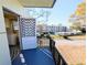 View of the balcony with a kitchen visible through an open door at 5973 Terrace Park N Dr # 301, St Petersburg, FL 33709