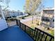 Overhead view of the balcony with a black metal railing that looks out at the community at 5973 Terrace Park N Dr # 301, St Petersburg, FL 33709