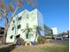 Exterior shot of condo building on sunny day at 5973 Terrace Park N Dr # 301, St Petersburg, FL 33709