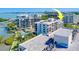 An aerial view showcasing building and bay views at 6 Belleview Blvd # 203, Belleair, FL 33756