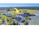 Scenic aerial shot of luxury condo buildings near a golf course, showcasing waterfront living at 6 Belleview Blvd # 203, Belleair, FL 33756