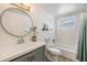 Bathroom with white tile, modern vanity, and shower-tub combination at 6303 Central Ave, New Port Richey, FL 34653