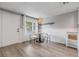 Cozy dining area featuring new flooring, and an open layout with modern lighting fixtures at 6303 Central Ave, New Port Richey, FL 34653