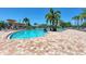 Resort style swimming pool with brick patio and ample chairs for relaxing at 7115 Marsh View Ter, Bradenton, FL 34212