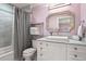 Charming bathroom with a marble countertop and decorative mirror at 1002 S Frankland Rd, Tampa, FL 33629