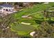 This aerial view shows the golf course with mature trees at 1002 S Frankland Rd, Tampa, FL 33629
