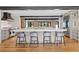 Bright, open kitchen with a large island, stainless steel appliances, and stylish bar stools at 1002 S Frankland Rd, Tampa, FL 33629