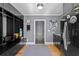 Convenient mud room with black cabinetry, storage cubbies, and built-in bench at 1002 S Frankland Rd, Tampa, FL 33629