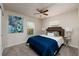 Inviting bedroom with natural light, ceiling fan, neutral color palette, and tasteful decor at 122 Coquina Bay Dr, St Petersburg, FL 33705