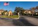 Community entrance featuring well-maintained grounds, mature trees, and clear signage, perfect for relaxed, secure living at 122 Coquina Bay Dr, St Petersburg, FL 33705