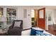 Bright living room with hardwood floors, natural light, modern furniture, creating an inviting and comfortable space at 122 Coquina Bay Dr, St Petersburg, FL 33705