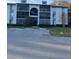 Three-story condo complex with screened balconies at 1308 Pine Ridge E Cir # E3, Tarpon Springs, FL 34688