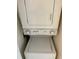 This laundry features a stackable washer and dryer at 1308 Pine Ridge E Cir # E3, Tarpon Springs, FL 34688