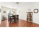 Bright dining room with hardwood floors and a china cabinet at 15701 Greyrock Dr, Spring Hill, FL 34610