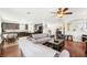 Open concept living room and kitchen with modern appliances and a breakfast nook at 15701 Greyrock Dr, Spring Hill, FL 34610