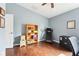 Home office with a bright window, closet and additional shelving at 15701 Greyrock Dr, Spring Hill, FL 34610