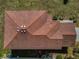 Detailed overhead view of the roof of a well-maintained single-Gathering home with skylights at 19609 Timberbluff Dr, Land O Lakes, FL 34638