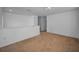 Open hallway with neutral carpet and white walls, creating a bright and airy space at 19609 Timberbluff Dr, Land O Lakes, FL 34638
