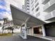 Well-maintained building entrance with modern design and covered walkway at 2401 Bayshore Blvd # 101, Tampa, FL 33629