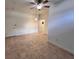 An empty room with ceiling fan and tan tiled floor at 2401 Bayshore Blvd # 101, Tampa, FL 33629