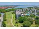 Aerial shot of beautiful resort, including the pool and landscaping at 2700 Cove Cay Dr # 4-B, Clearwater, FL 33760