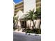Attractive building entrance featuring nice landscaping and ample space to welcome residents and guests at 2700 Cove Cay Dr # 4-B, Clearwater, FL 33760