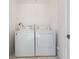 Laundry area featuring a side by side washer and dryer at 2700 Cove Cay Dr # 4-B, Clearwater, FL 33760