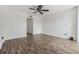 Bright living room with laminate flooring and ceiling fan at 2700 Cove Cay Dr # 4-B, Clearwater, FL 33760