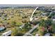 Aerial view of the property highlighting its spacious lot, mature trees, and neighborhood charm at 3307 Fox Ridge Blvd, Wesley Chapel, FL 33543