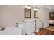 Bathroom features a large tub, dual sinks, and modern fixtures, creating a spa-like atmosphere at 3307 Fox Ridge Blvd, Wesley Chapel, FL 33543