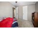 Bedroom featuring a bed, neutral walls, carpet flooring, and a closet for ample storage at 3307 Fox Ridge Blvd, Wesley Chapel, FL 33543
