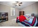 Bedroom featuring a bed, neutral walls, carpet flooring, and a closet for ample storage at 3307 Fox Ridge Blvd, Wesley Chapel, FL 33543