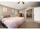 Bright bedroom featuring carpet, ceiling fan, and plenty of natural light at 3307 Fox Ridge Blvd, Wesley Chapel, FL 33543