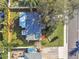 Aerial view of a home showcasing the backyard, patio, and well-maintained landscaping at 349 Shirley Ave, Belleair, FL 33756
