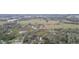 The aerial view showcases the property's location within a serene, green environment at 36246 Peak St, Zephyrhills, FL 33541