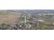 The aerial photo shows the home's setting with agricultural land nearby, combining rural charm at 36246 Peak St, Zephyrhills, FL 33541