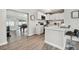 Bright kitchen featuring a breakfast bar, stainless steel appliances and pass through to the game room at 3907 Elkcam Se Blvd, St Petersburg, FL 33705